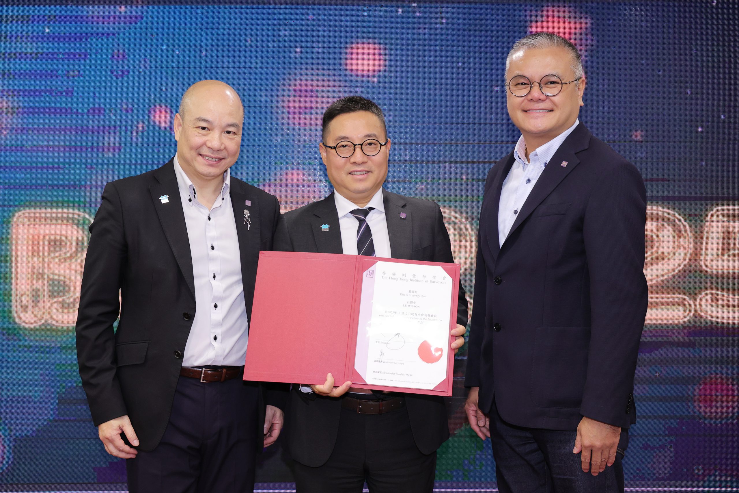 Prof. Wilson received the Honorary Fellowship of Hong Kong Institute of Surveyors (HKIS)